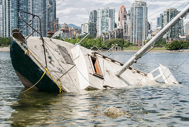 Shipwreck in front of a city