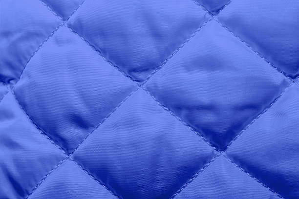 istock quilted fabric texture of white color for hammering, 546806882