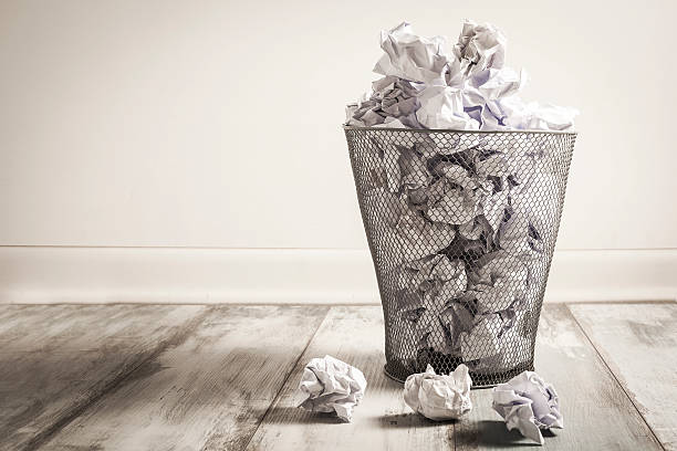istock Crumpled paper in the trash can 546807894