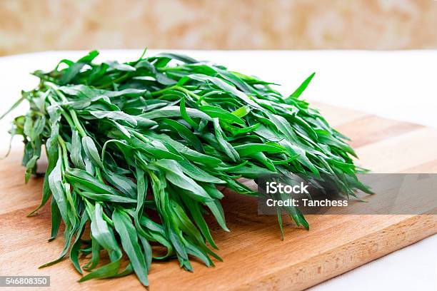 Bunch Of Fresh Tarragon On A Wooden Board Stock Photo - Download Image Now - Tarragon, Agriculture, Armenia - Country