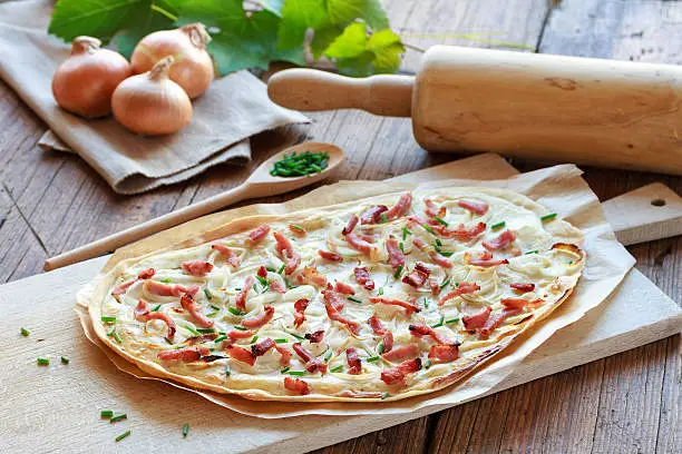 Photo of hearty tarte flambée