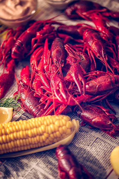 istock Delicious Boiled Red Crayfish with Sweet Corn and Potatoes 547010874