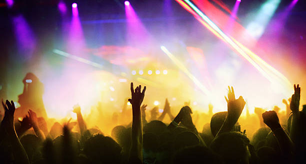 istock People at concert party. 547011742