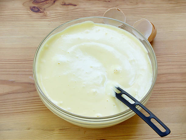 istock mix pounded chicken egg yolks with sugar and beaten egg whites 547012114