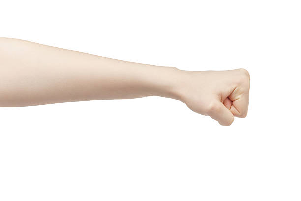 istock young female hand shows fist 547012848