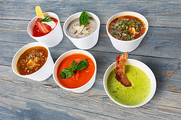 istock Variety of soups from different cuisines at blue wood 547015844