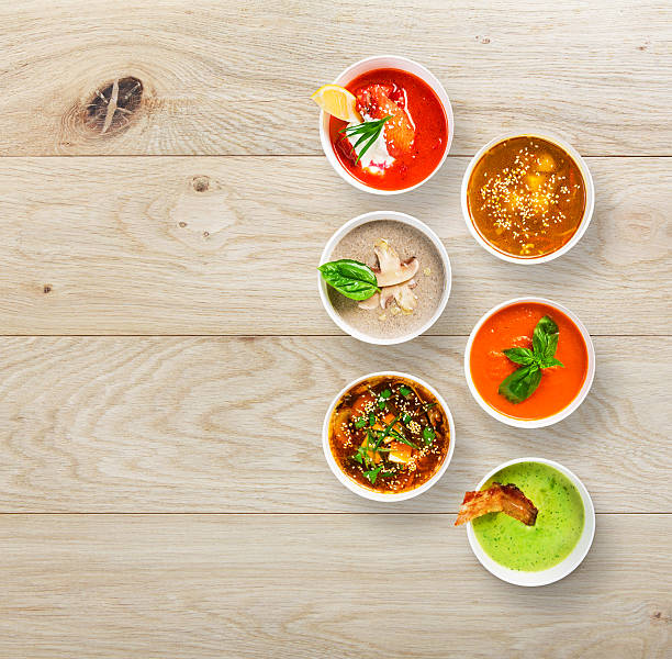 istock Six soups at wood, top view with copy space 547015996