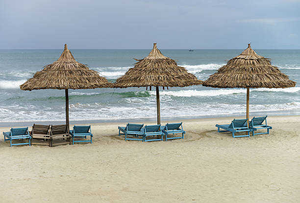 istock Palm shelter and sun beds in the China Beach 547019106