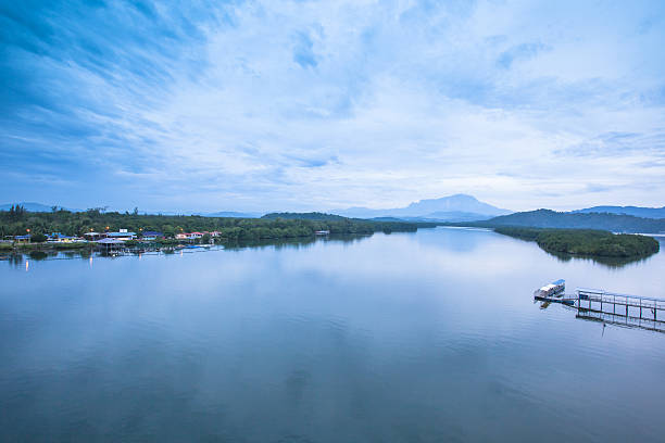 istock river with background of Mount Kinabalu 547023852