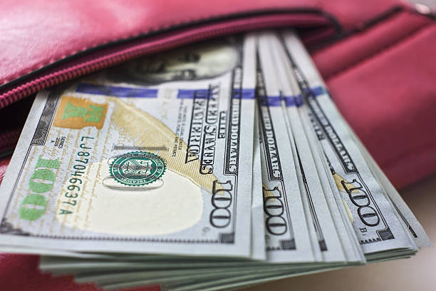 istock dollar notes in a wallet, hundred-dollar bills are in   bag, 547024074