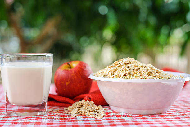 Dry rolled oat flakes oatmeal stock photo