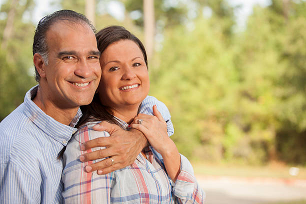 istock Mature, mixed-race couple outdoors in summer. 547028148