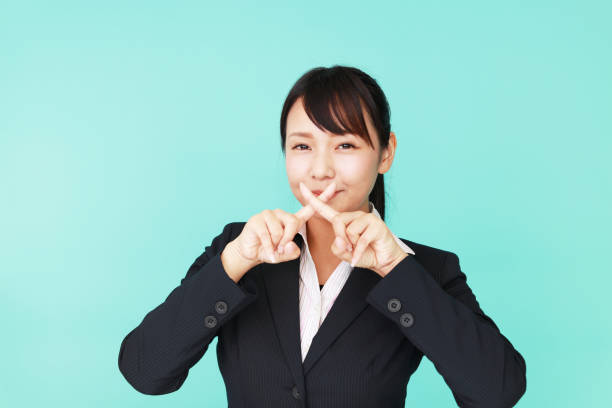 istock Woman covers her mouth 547031392