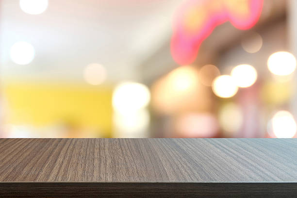 istock Top of wood table on  blurred 547032112