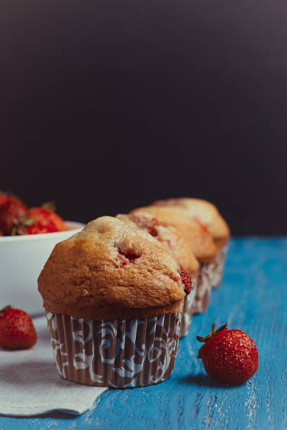 istock Homemade muffins with strawberries 547040124