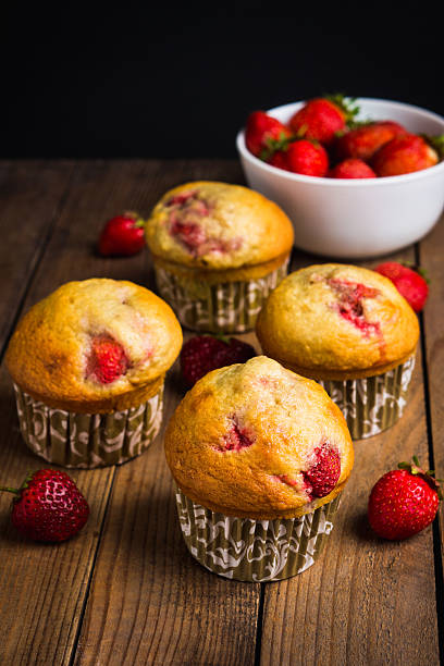 istock Homemade muffins with strawberries 547040864