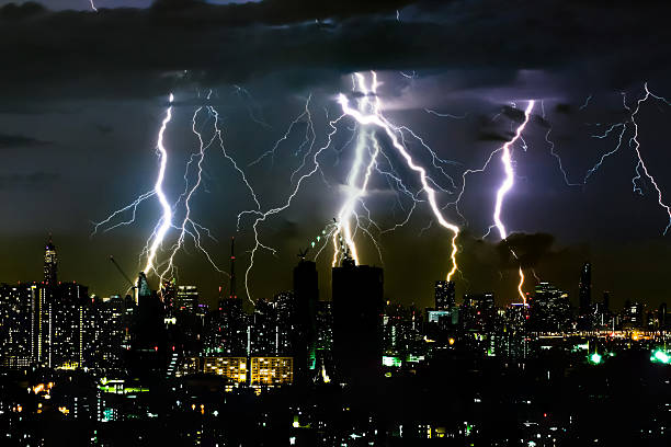 istock Thunder storm lighting bolt on the horizontal sky and cityscape 547040984