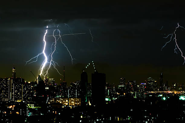 istock Thunder storm lighting bolt on the horizontal sky and cityscape 547041342