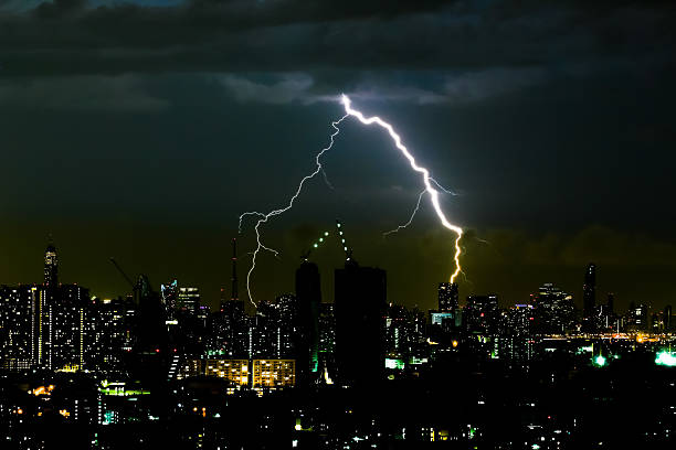 istock Thunder storm lighting bolt on the horizontal sky and cityscape 547041428