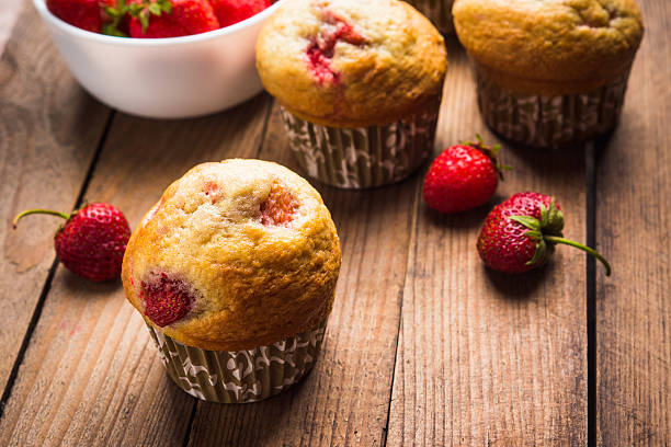 istock Homemade muffins with strawberries 547041550