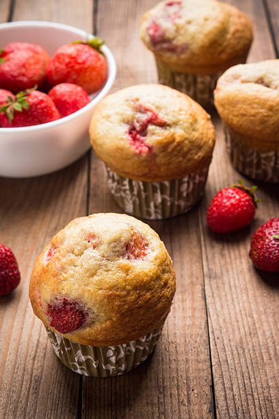 istock Homemade muffins with strawberries 547041658