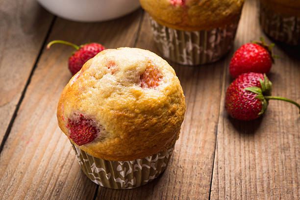 istock Homemade muffins with strawberries 547041774