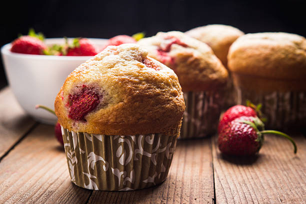 istock Homemade muffins with strawberries 547041868