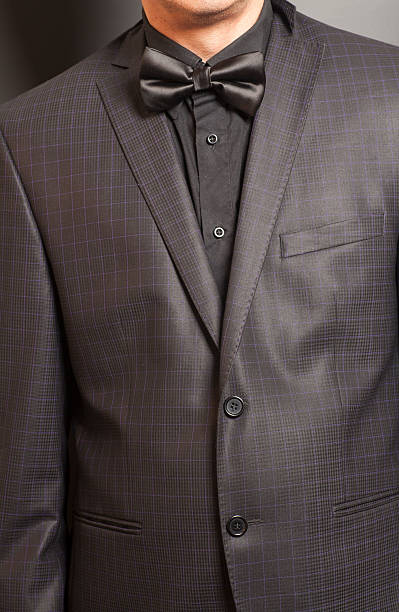 istock Man in Checkered suit and black and black bow tie 547043258