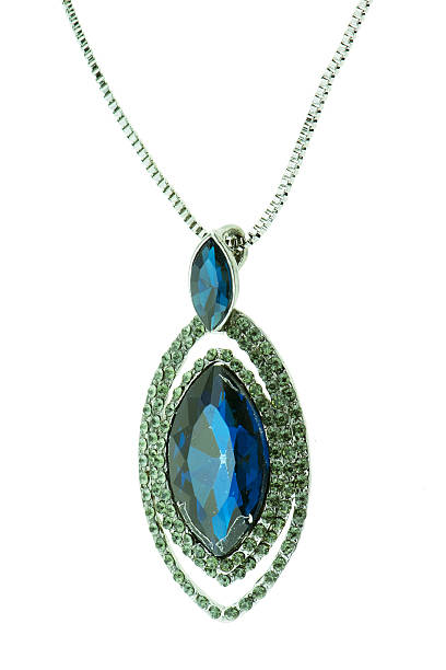 istock necklace with blue gem isolated on the white background 547043844
