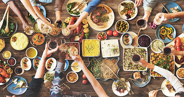 istock Friends Happiness Enjoying Dinning Eating Concept 547044364
