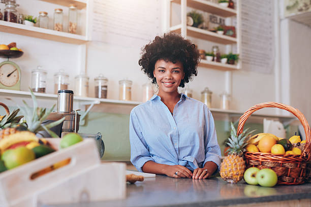 istock Proud young female juice bar owner 547044366