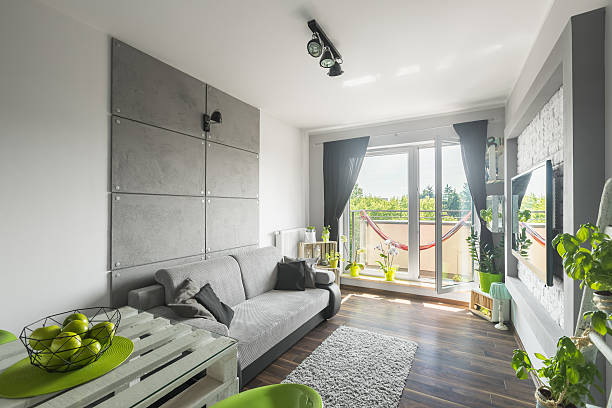 istock Grey and white living room idea 547044910