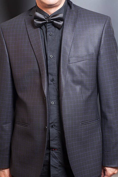 istock Man in Checkered suit and black and black bow tie 547045370