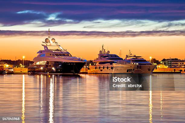 Luxury Yachts Harbor At Golden Hour View Stock Photo - Download Image Now - Yacht, Luxury, Marina