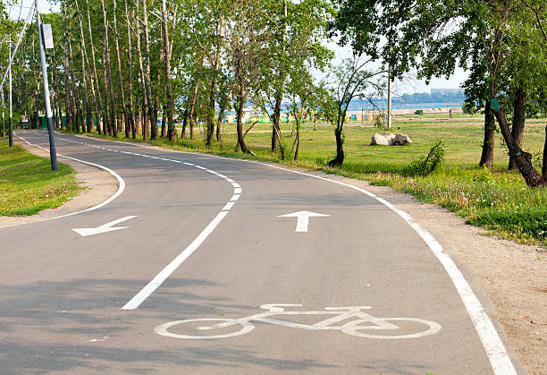 istock bike path in the park 547046684