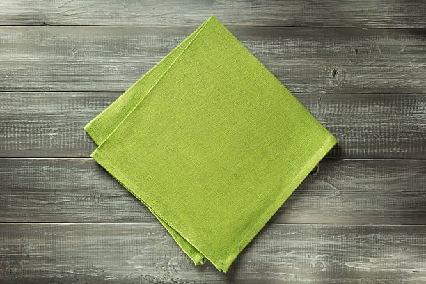 istock cloth napkin on wooden background 547047066