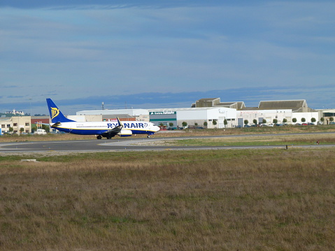 Santander, Spain - December 20, 2010: Ryanair airplane preparing for departure at Severiano Ballesteros airport (Santander, Cantabria).