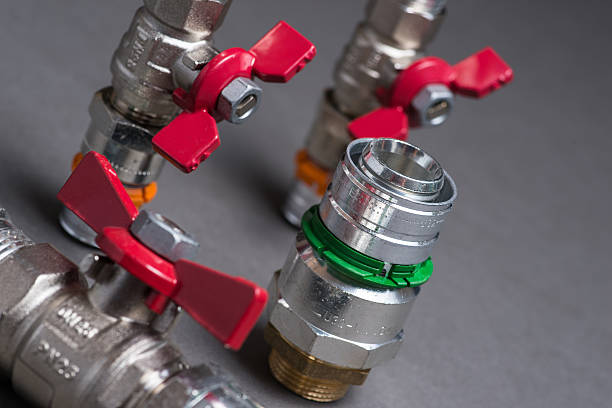 istock Water valves with fittings on grey 547048296