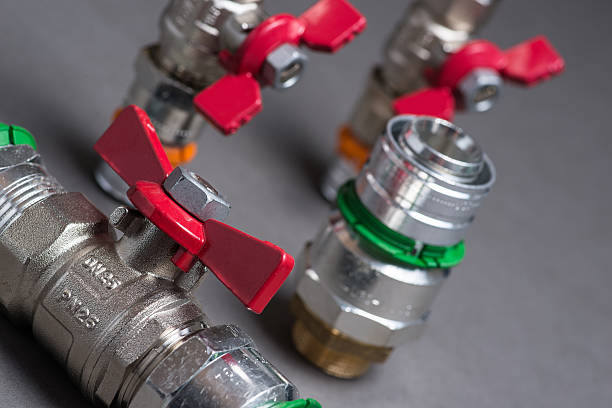 istock Water valves with fittings on grey 547048448