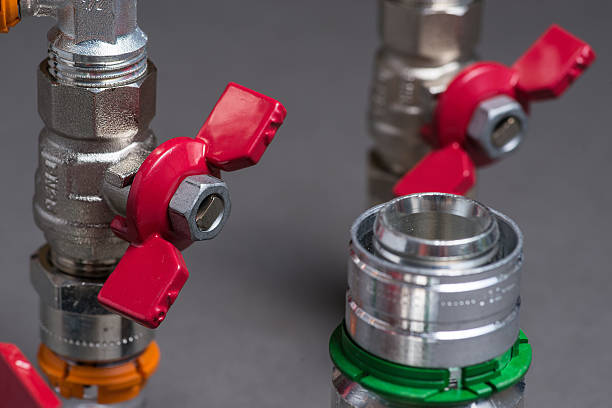 istock Water valves with fittings on grey 547048594