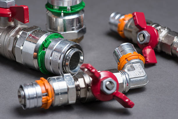 istock Water valves with fittings on grey 547049222