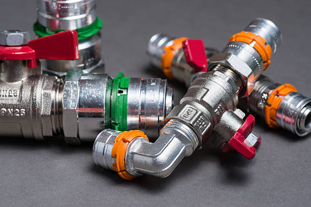 istock Water valves with fittings on grey 547049958