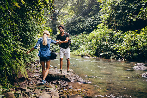 istock Couple in forest by the stream 547050682