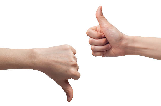 istock two hand holding sign good and bad sign. 547050782