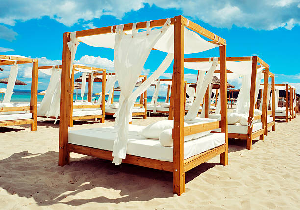 istock beds in a beach club in Ibiza, Spain 547050876
