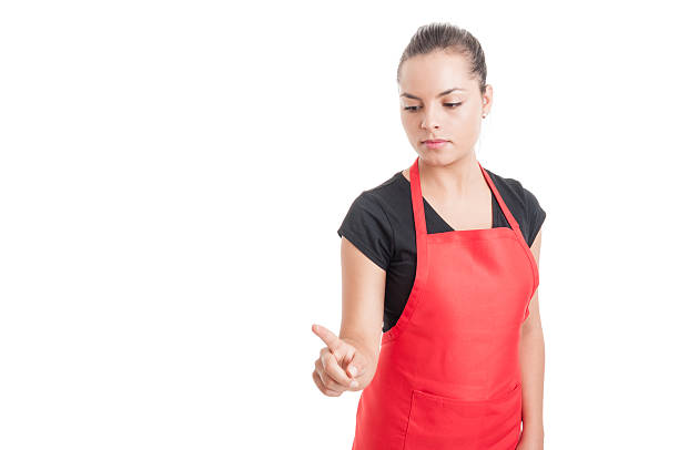 istock Young female market employee pointing something down 547051104