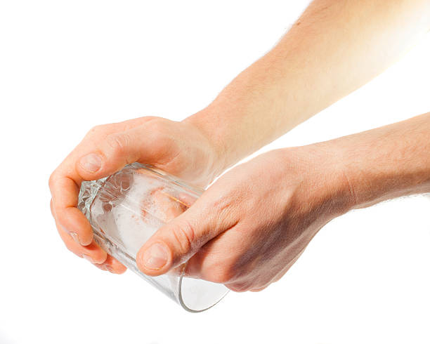 Man's hands washing dishes. On a white background