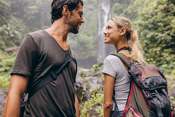 istock Romantic young couple together on hike 547051624