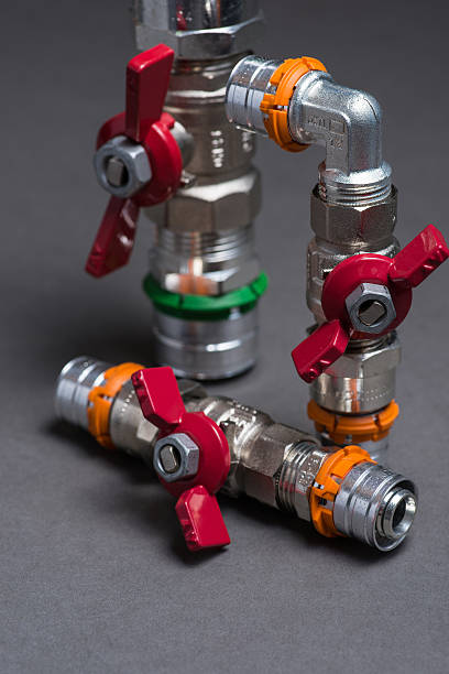 istock Water valves with fittings on grey 547051890