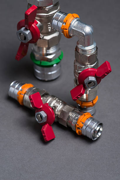 istock Water valves with fittings on grey 547052002